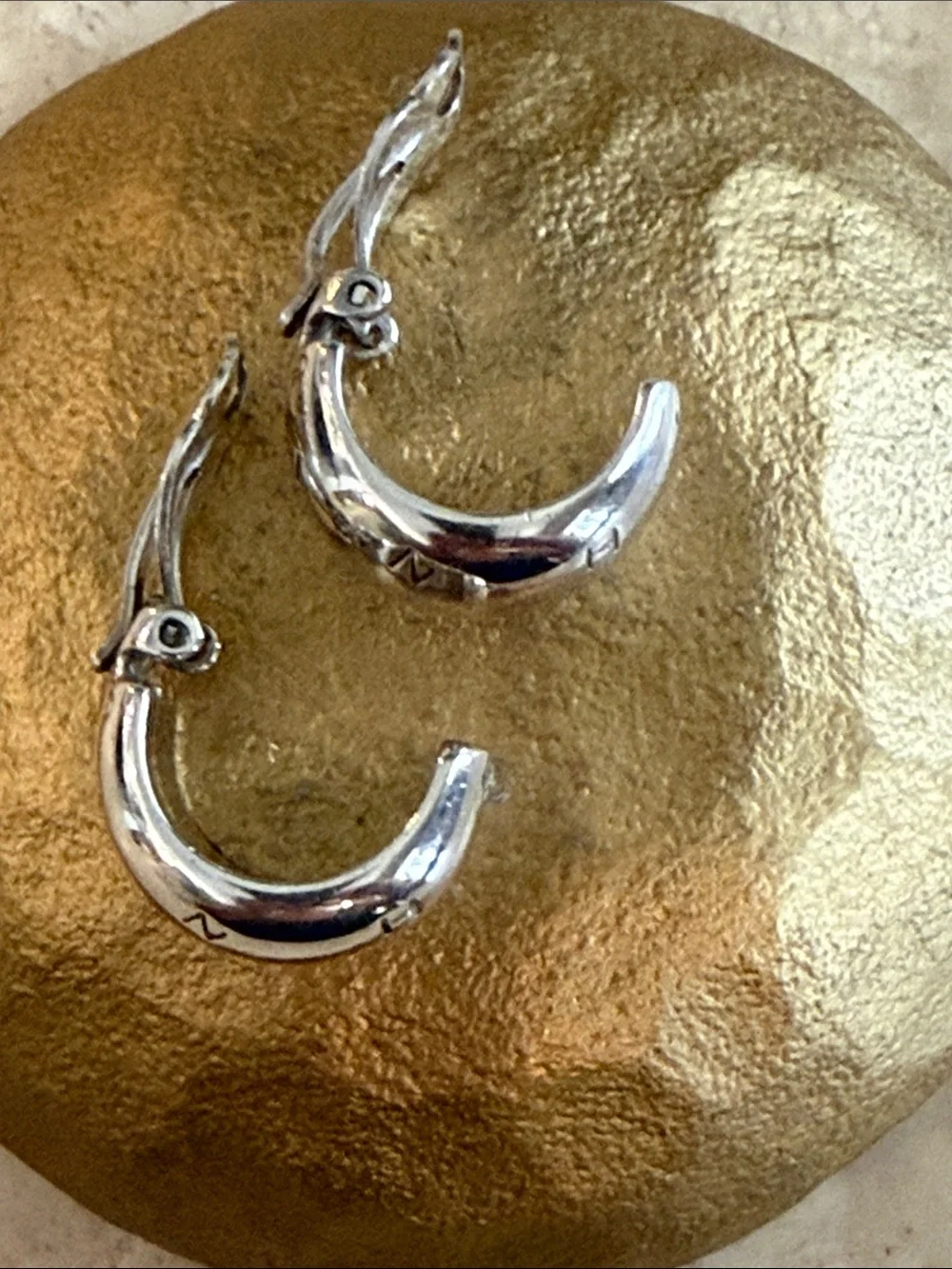 CHANEL Sterling Silver Logo Clip Hoop Earrings